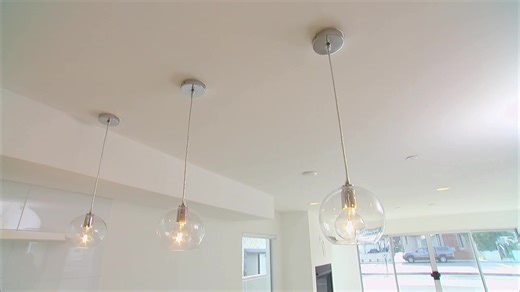 A couple's dream of buying a $1 million vacation home in Newport Beach, California, is put to the test when they disagree over its style. He's pushing for a cozy cottage with a lived-in feel. She insists on a stark white contemporary home. | House Hunters