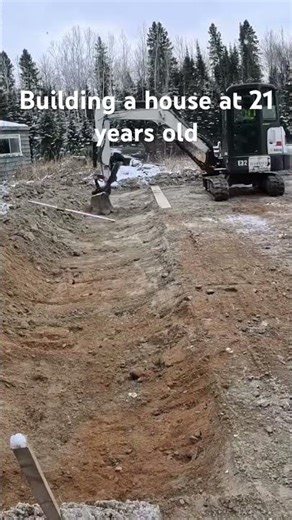 Digging the step footing for the slab.