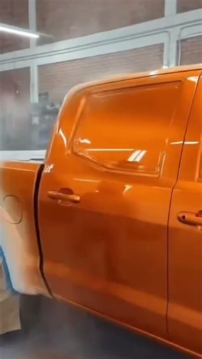 Spray painting a custom ordered car with a rare and striking bright orange color finish today#viral