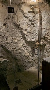 Would you step into a shower carved straight out of a mountain? 🪨🚿 We sculpted this custom cave shower entirely from artificial rock—designed to feel like nature, built to last a lifetime. 👉 Would you relax here or is it too wild for your home? #LuxuryLiving #BathroomGoals #CustomDesign #LuxuryBathroom #SpaVibes #ArtificialRock #ConcreteDesign #Rockscaping #CraftedNotCarved #DesignBuild #DreamShower #CaveShower #NatureInspired #HomeGoals #WowFactor | Rockscapes