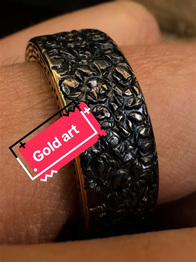 Stylish Black and Gold Fretwork Ring Design