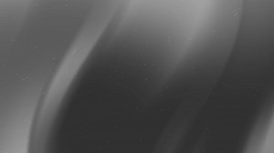 Gray gradient background with light gray dust specks. Suitable for elegant, minimalistic designs or as a neutral backdrop for various projects.