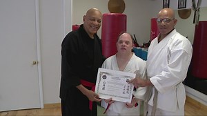 Man with Down Syndrome earns karate black belt