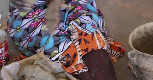 African Woman make clay pottery traditional village Ghana. Northern Ghana art and craft village specializing in pottery, baskets, leather and painting. Income producer for tourism and export