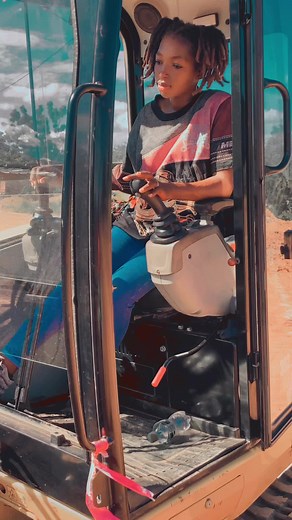 Operating a CAT Excavator: Construction Site Insight