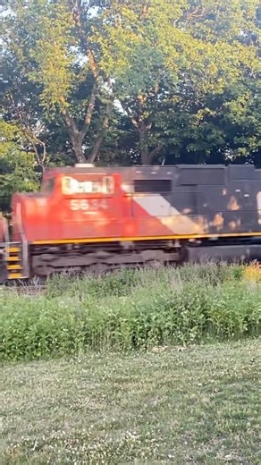CSX 3143 leads CSX M410 with 6 engines and CN 5634 trailing 6/20/2022