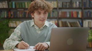 Student participating in an online webinar - Free Stock Video