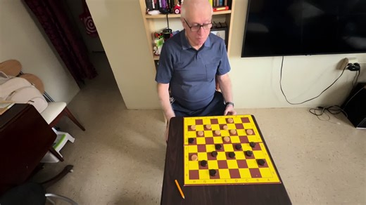 Mastering Russian Checkers: Strategy and Play