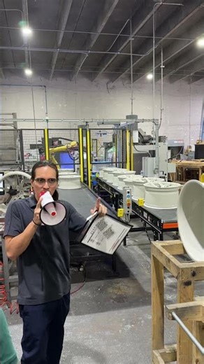 Fanuc R2000ic 165F quality control cell on the manufacturing floor