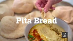 Chewy, perfectly-puffed pita bread at home? It's easier than you think. Get the recipes: bit.ly/milkstpitabread bit.ly/milksthummus | Christopher Kimball’s Milk Street