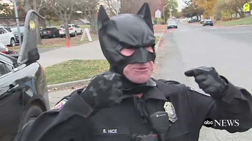 Batman cop surprises elementary school students with tricked-out Batmobile