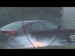 Watch: Downed power line causes car explosion