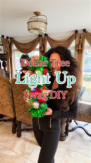 Bethany Mortellaro on Instagram: "🎄Dollar Tree LIGHT UP Swag DIY I love the lights on these swags! This DIY is so fun and festive for dressing up the kitchen cabinets, chairs, staircases, and more! Item needed from DT: -Wreath hanger -Pool noodle -Red and green tinsel garland -Tinsel pipe cleaners -Ornaments -2 different wire ribbons -Battery-operated LED lights Directions: -Cut the pool noodle down in size to fit the length of the wreath hanger. Push the wreath hanger through the center hole o