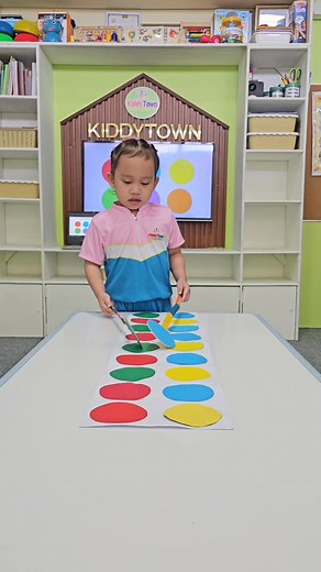 Playgroup Class Students develop skills like color recognition and...