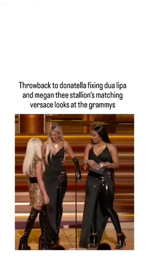 smile fuel on Instagram: "This instagram post shares a 17-second video clip from the 2021 Grammys red carpet, capturing Donatella Versace adjusting Megan Thee Stallion's custom Versace gown while Dua Lipa, both in near-identical black latex dresses with gold chain details and thigh-high boots, laughs alongside, highlighting a spontaneous yet glamorous fashion fix. The moment, from the 63rd Annual Grammy Awards on 14 March 2021, went viral for showcasing Versace's hands-on celebrity styling, with
