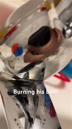 Burning his balls in hot water #bathroom