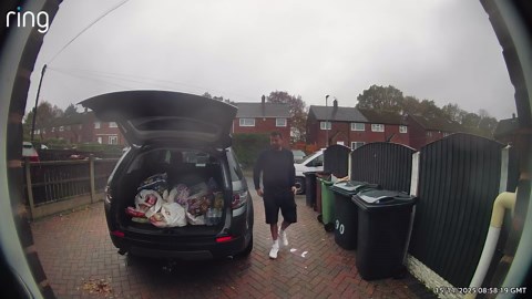 Boot lid strikes back while gentleman tries to take out shopping