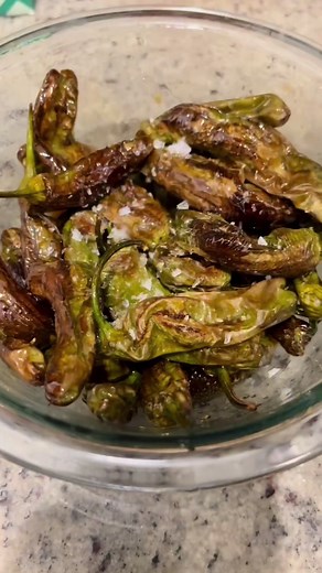 shishito peppers in the air fryer with soy sauce, lemon juice, lemon zest and spicy honey