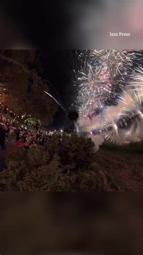 Shocking moment fireworks display shoots exploding sparks into screaming crowd | The Sun