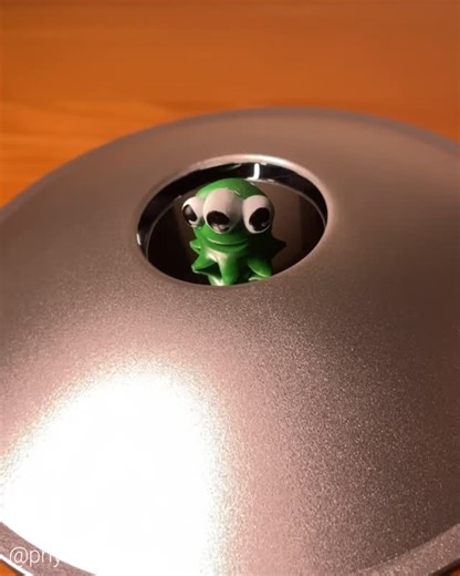 physicsfun on Instagram: "UFO Mirascope: two parabolic mirrors create a 3D image above the actual object. The image of the tiny alien made here is not a hologram and is produced solely by reflection of light rays between special concave mirrors. Love the space saucer theme on this version. The mirascope design principle was discovered circa 1969 by Landry and Elings at UC Santa Barbara. ➡️ Follow the link in my profile for info on where to buy this and other amazing items featured here on @physi