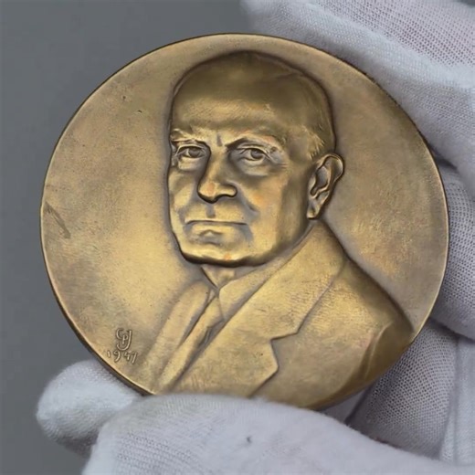 1947 IBM Commemorative Medal United States Obverse: Portrait of a man facing forward wearing a suit, finely detailed relief. Obverse legend: Signed “CP 1947” at lower left (artist’s initials). Reverse: Encircled by a laurel wreath, inscribed text honoring IBM employees. Reverse legend: “TO ALL MEMBERS OF THE IBM ORGANIZATION IN APPRECIATION OF THEIR LOYALTY, COOPERATION AND EFFORT IN BEHALF OF THE CORPORATION AND IN COMMEMORATION OF ITS THIRD OF A CENTURY OF PROGRESS 1914–1947.” Signed: “Thos. J