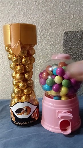 Large punk gumball candy machine dispenser with small gold chocolate #shorts