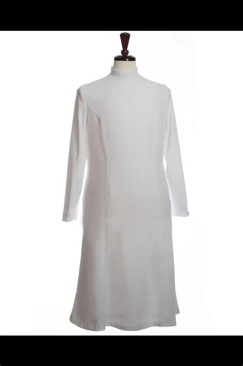 Redingote Flare Style Three-Quarter Length Clergy Dress (White) #mercyrobes #usa #trending#newvideo A clergy collar can be worn with this dress. Buy Now : https://www.mercyrobes.com/shop/redingote-flare-style-three-quarter-length-clergy-dress-white #mercyrobes #trending #newvideo #trendingcollections #fashion #church #clothing #trendingcollection #pastor #clergy #religious #christian #2023 #god #jesus #america #canada #ladiesfashion #newvideo #fashion #latestnews #robe #pulpit #allmight #viral #