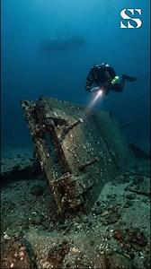 Dam floodgate section rests submerged on seabed hinting halted water flow and abandoned structure as ocean quietly reclaims human traces beneath deep blue silent depths #seasecret #fblifestyle #ocean #wreck #depths | Sea secret