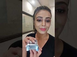 Chain smoking girl in shorts