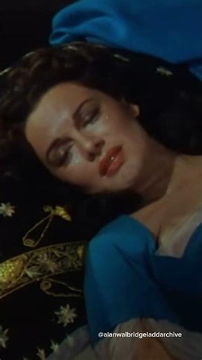 John (Alan Ladd) rescues damsel in distress, Linet (Patricia Medina) in The Black Knight (1954)