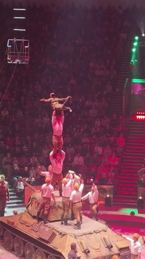 Another stunt from the great moscow circus exhibiting balance and coordination.