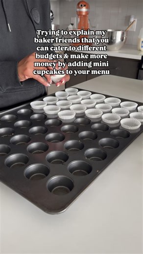 Bryonna| Luxury Cakes & Cupcakes | Educator & Mentor on Instagram: "Ok here’s why & how you’re gonna do it👇🏾 ✨Why? Because mini cupcakes take half the time, half the box size, half the bake time, but have the potential to make you even more than standard/full-size cupcakes (I usually suggest customers order 2 per guest) ✨How? 1️⃣Youre gonna use the same recipes you use for your full-size cupcakes. No need to make an entire new menu. 2️⃣If you don’t offer cupcakes at all yet on your menu, you’r
