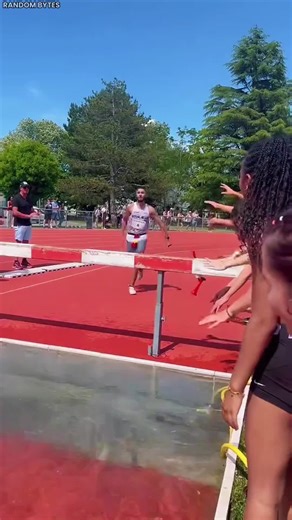 Why do runners jump into a water pit during a race? #runners #jump #water #game #athlete