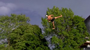 Watch people hurl themselves into a pool in this belly flop contest