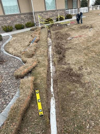 Our team provides seamless rain gutter line solutions. See how we transformed this yard, ensuring proper water diversion and safeguarding the home's foundation from potential erosion and water damage. Invest in your home's longevity. Contact us for a free estimate on your drainage project! #WaterManagement #HomeImprovement #DrainageSystem #SCConstruction #IdahoContractors | SC Construction & Property Maintenance LLC | Facebook