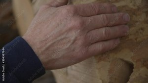 Logging wood mill in Northern Michigan with piles of logs getting cut into lumber wood planks machine lumberjack picking the best wood for the house he is going to build for his family