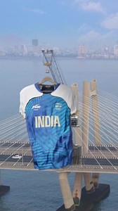 The Team India Jersey flies high over the Worli Sea Link in Mumbai, just like the Nation's spirit. With enormous love to show, JSW is proud to support the athletes going to the Paris Olympics next week. It’s an honor to make the official jersey of our champions. The game is on, let's keep the cheers going strong. Desh ke liye khelna hai toh #RuknaNahiHai JSW Sports #JSW #TeamIndia #IndianOlympics #MumbaiSealink #ProudSponsor #BetterEveryday | JSW Group