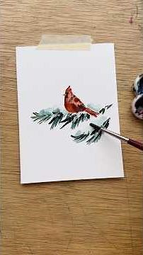 Day 7 of watercolor holiday card making - a cardinal on a snowy brunch