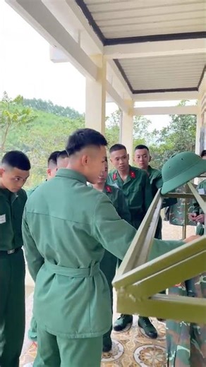 The squad leader is dedicated to the new recruits.