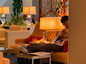 Is It Poor Lounge Etiquette To Put Your Feet On Furniture? - Live and Let's Fly