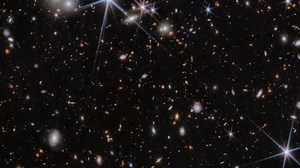 The JWST has detected the farthest black hole collision ever observed, occurring when the Universe was just 740 million years old. This event involves the merger of two galaxies and their central supermassive black holes in a system known as ZS7. One of these black holes has a mass 50 million times that of the Sun. Observing such early and massive black holes helps address key cosmological questions about the formation and growth of galaxies and black holes. The findings suggest that merging is 