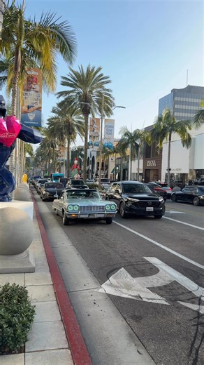 A 1964 Chevrolet Impala SS Lowrider cruising Rodeo Drive is pure LA car culture, blending classic American muscle with West Coast style. Current market value ranges from $45,000–$80,000, with fully built lowrider examples fetching even more depending on hydraulics and restoration quality. The ’64 Impala is the most iconic lowrider platform ever, thanks to its X-frame chassis that made hydraulic setups legendary. Seeing one here is a reminder that Rodeo isn’t just supercars—it’s history on wheels