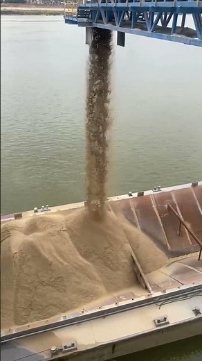 Barge loading river sand