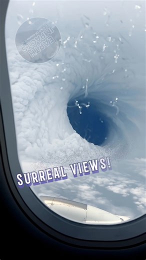 Twisting cloud seen sideways from a plane window ✈️ A massive spiral of clouds tilts dramatically, stretching across the horizon as if the sky itself is leaning. The sheer scale and motion are hypnotic, twisting gently in the wind. #airview #cloudspiral #fromabove #earthsky #fblifestyle #cloudformation #hurricane #cyclone #weather #skywatch #flightview #stormclouds #Earthimpacts #twistingcloud #atmosphere #openartai This video was created using AI for visual storytelling purposes. | Earth Impact