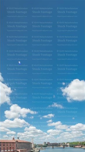 Beautiful blue sky timelapse with soft white clouds moving forward.