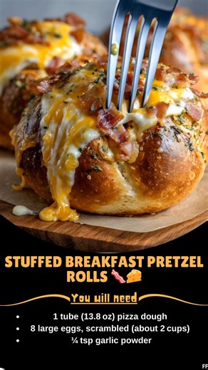 Stuffed 🏠 Breakfast Pretzel Rolls 🥓🧀 Soft pretzel rolls filled with cheesy scrambled eggs and bacon—like breakfast in a bakery-style bite! 📝 Ingredients: For the rolls: 1 tube (13.8 oz) pizza dough 8 large eggs, scrambled (about 2 cups) ¼ tsp garlic powder ..... Full Recipe in Coʍmеոτ 💬 🌍 | Mommy Needs A Recipe
