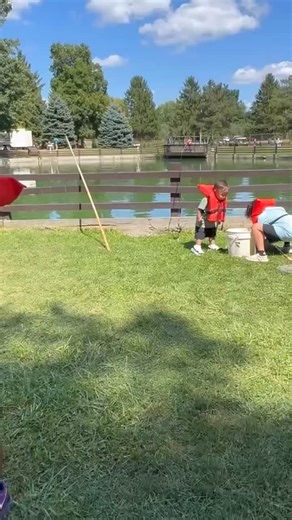 One of our amazing fishermen reels into something he almost can’t handle. But luckily he knew a secret technique 😉😄 | Spring Valley Trout Farm