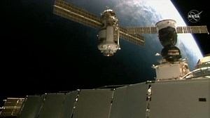 Russian lab module docks with space station