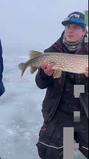 Our future ice fisherman and his first time on ice fishing. What a great catch! | Trophy Ice Fish
