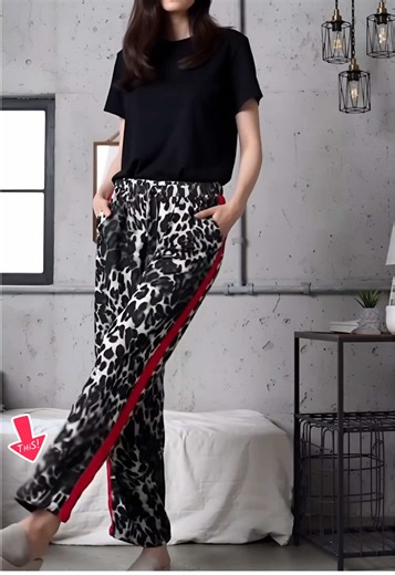😝“These leopard track pants are so versatile 🖤 Pair with a black tee for casual cool, a crop top for brunch, or a blazer for work—fits 88-154lbs seamlessly. Red side stripes add extra edge, stretchy fabric keeps it comfy—one pair, endless looks. Who’s styling these multiple ways? Drop a 🔥 #StretchyLeopardPants #OutfitInspo #CasualChic #TikTokStyle”